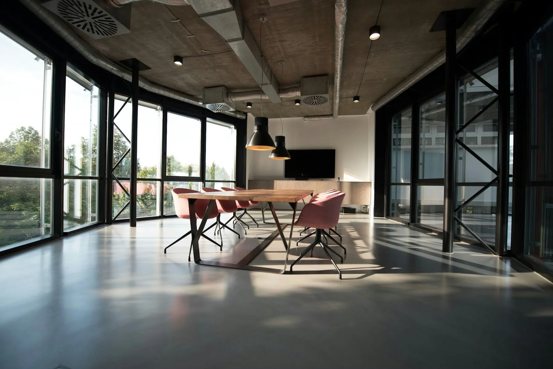 A corporate meeting room arranged for program planning